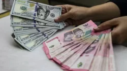 Sempat Menguat ke Level Rp17.900, Rupiah Ditutup Melemah Tipis ke Rp17.965 per Dolar AS